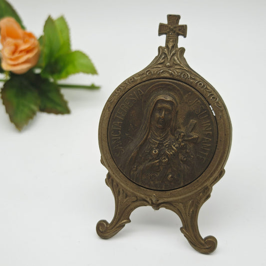 Cast metal holy image of Therese of Lisieux Sancta Teresia A Jesu Infante Christian Catholic table display icon altar medallion relief medal relic pilgrimage home altar